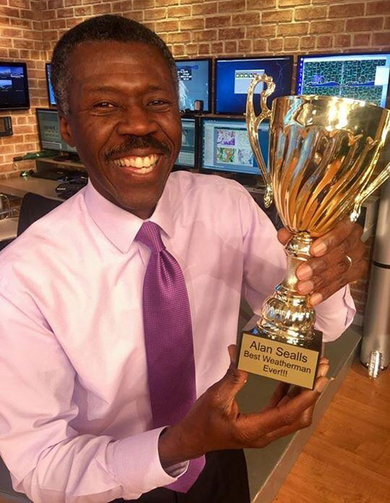 The best weatherman ever just received this trophy from his news station!