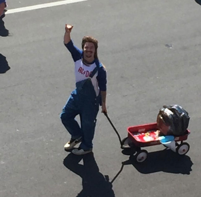 A friend of mine pulling a fake meteorite in my towns parade. The mullet is legit