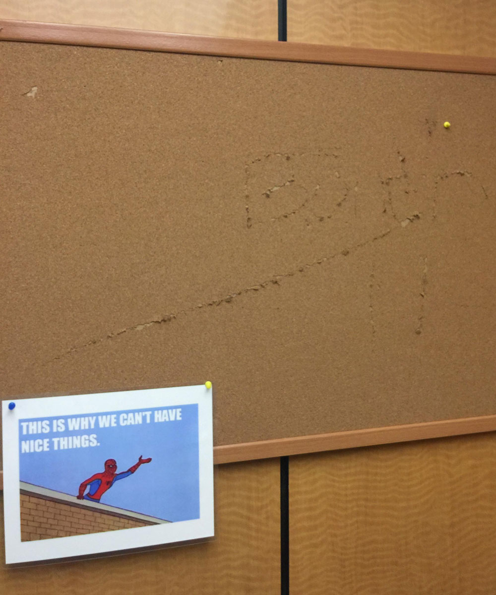 My landlord put this sign up in our elevator after a drunk tenant left his mark on the bulletin board