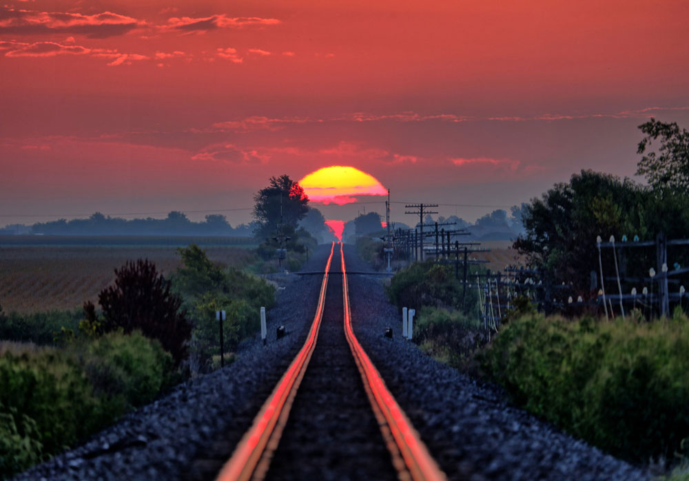 My dad waits every year for the day the sun rises just right and reflects along the railroad tracks, Today was that day!