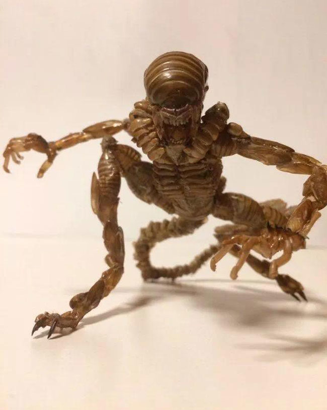 Alien figure made from cicada shells