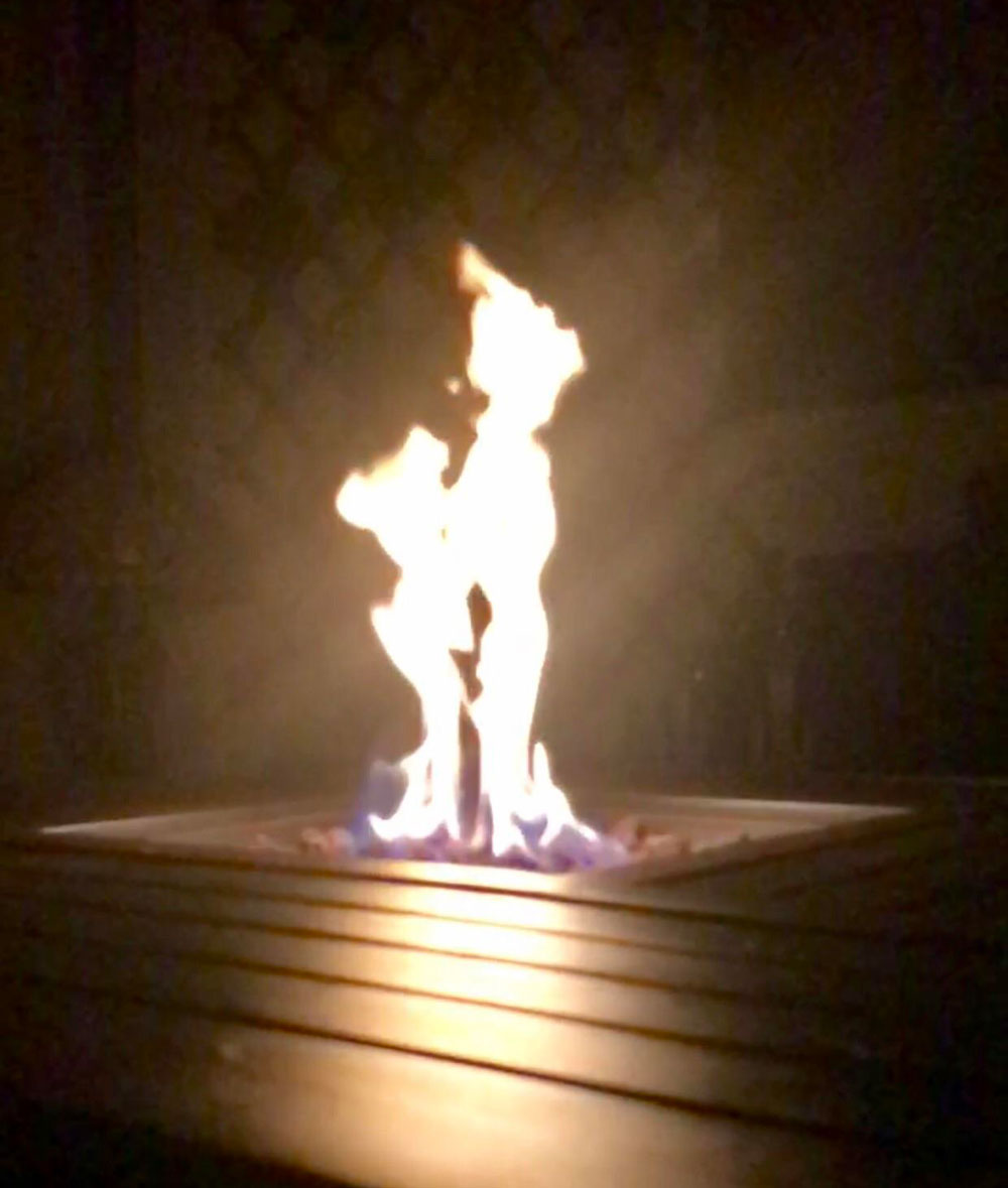 Took a picture of my fire pit last night and caught Peter Pan and Tinkerbell