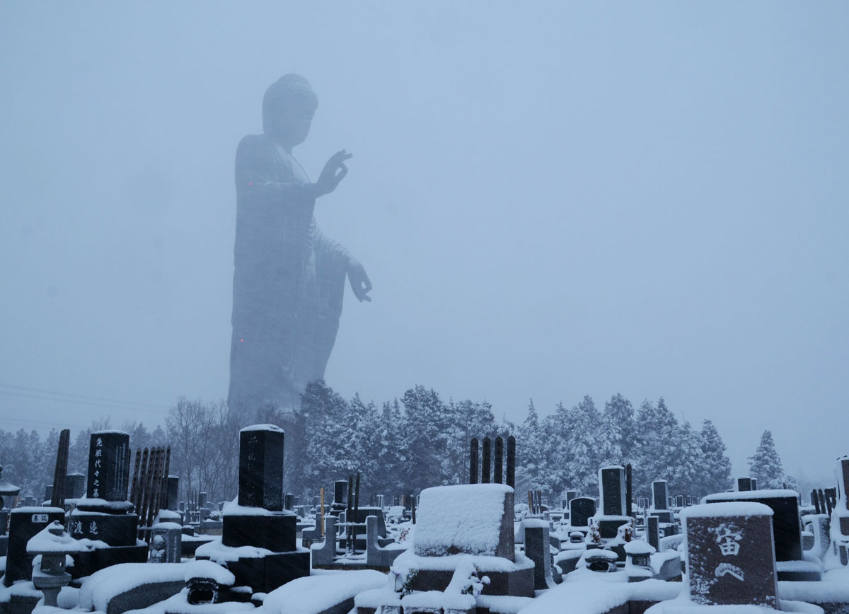 Ushiku Daibutsu in Japan, one of the tallest statues in the world, as seen in this winter landscape