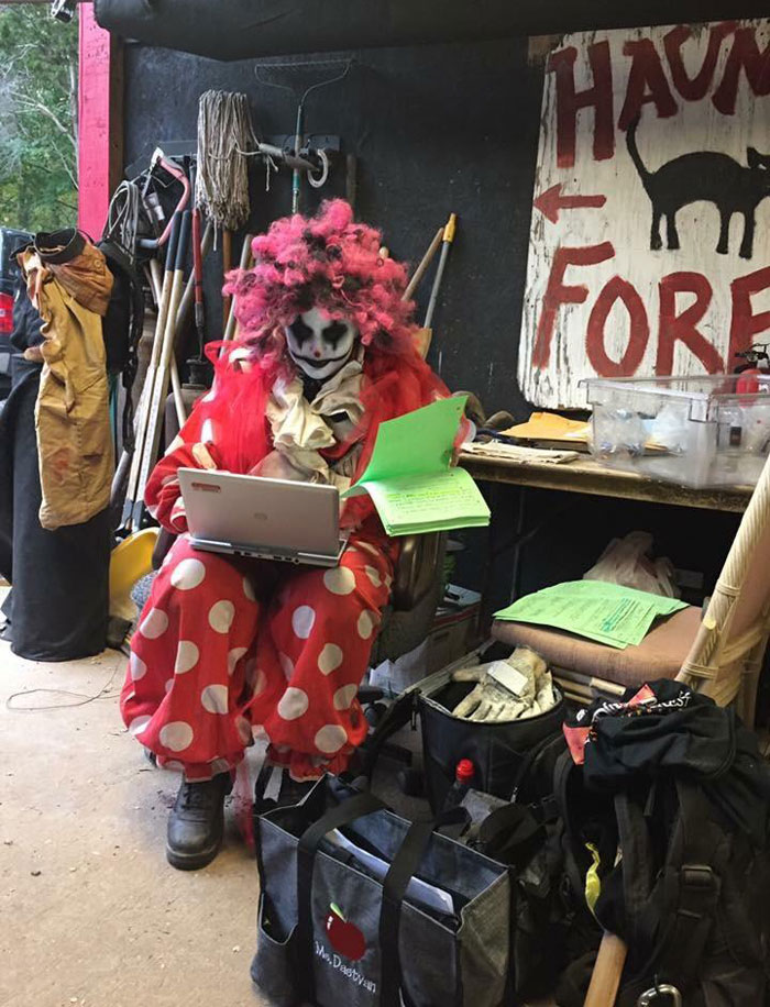 My friend is a math teacher but works at the haunted forest on the weekends. Here she is grading 150 tests in the best way possible