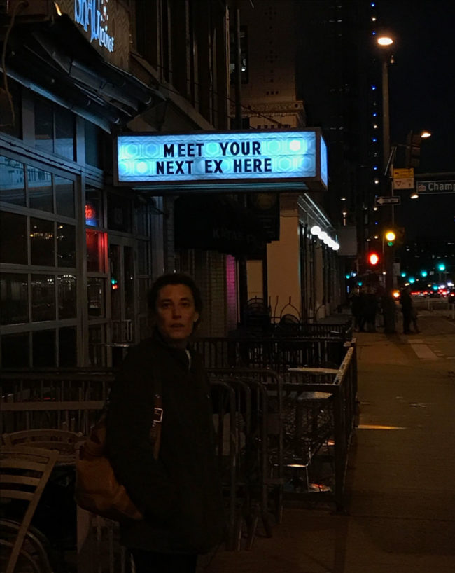 A sign for a bar in Denver co