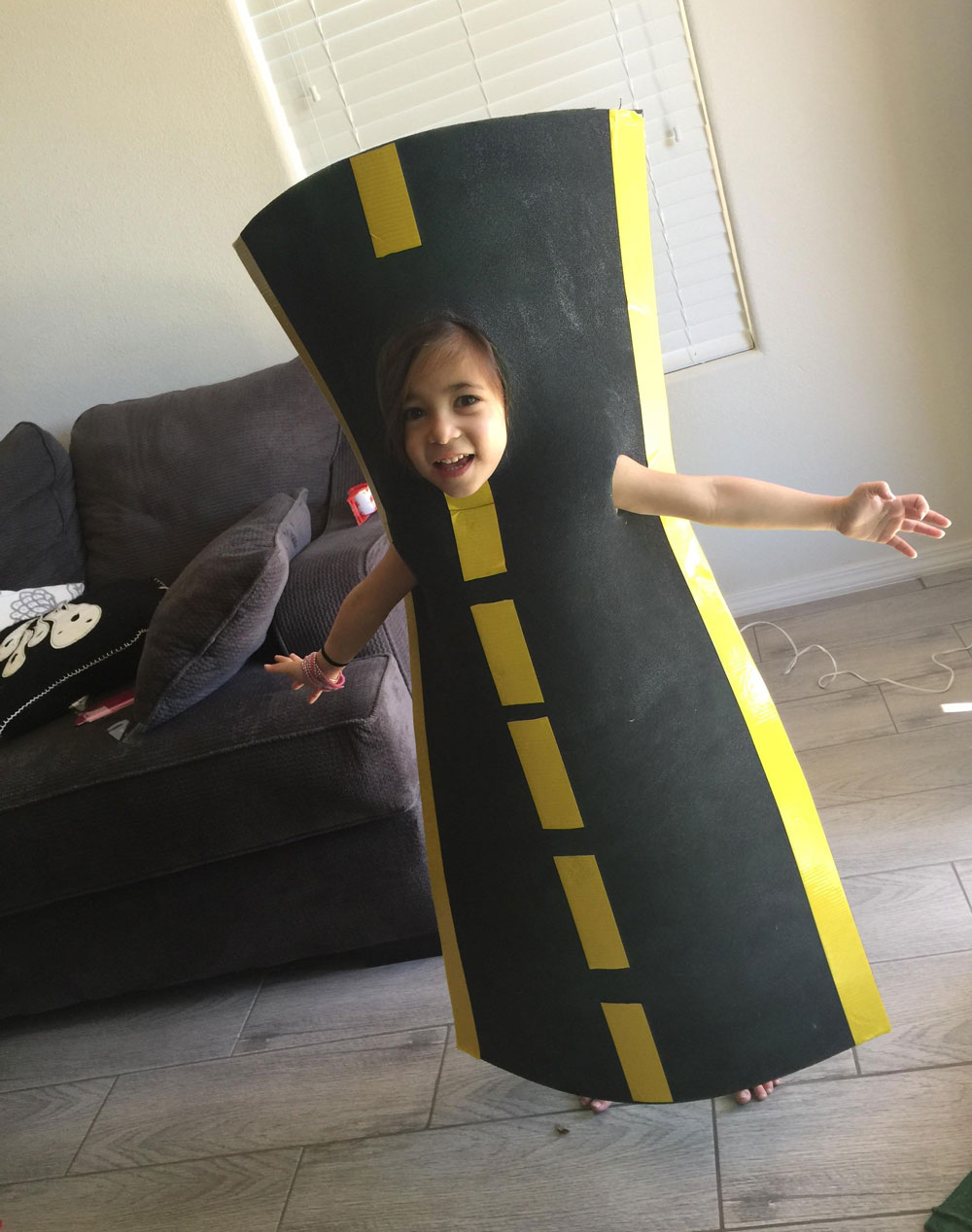 My little cousin wanted to be a road for Halloween, so my aunt made her this costume