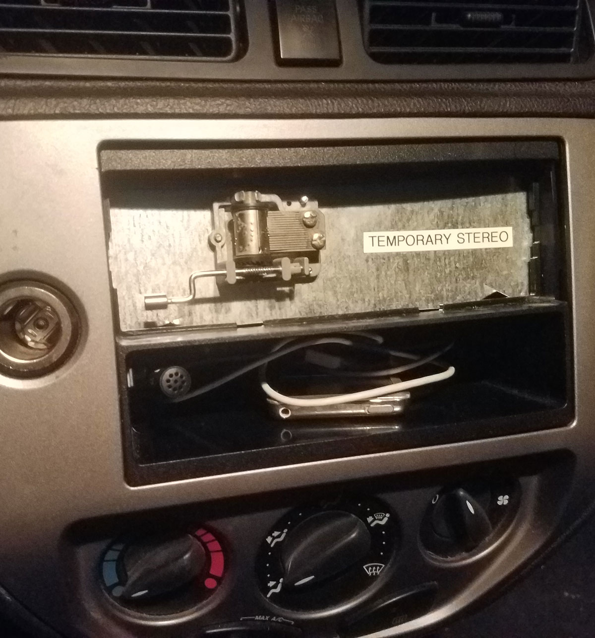 Sent the wife's car stereo off for a replacement. She'll have to live with this until then
