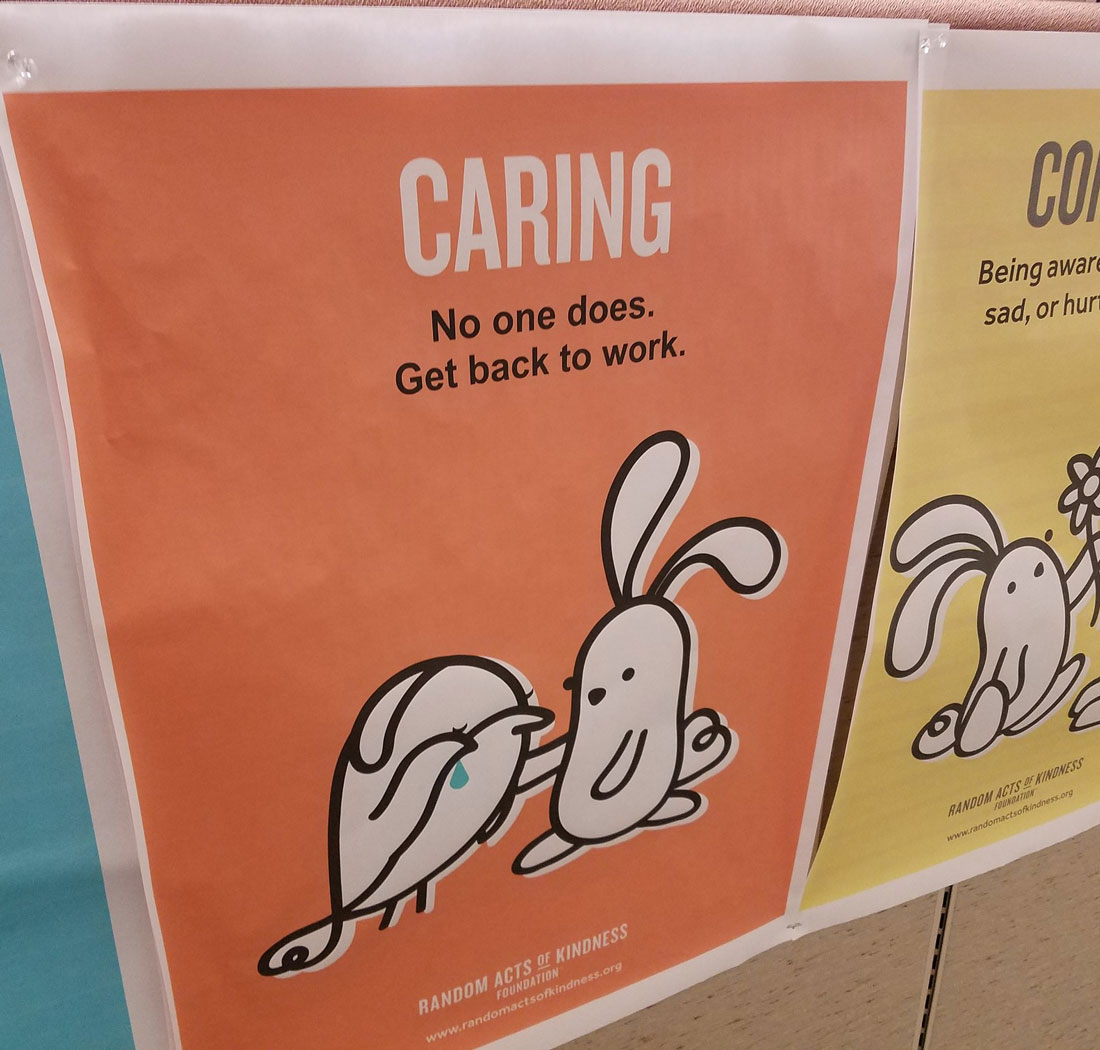 Workplace motivation posters set up last week
