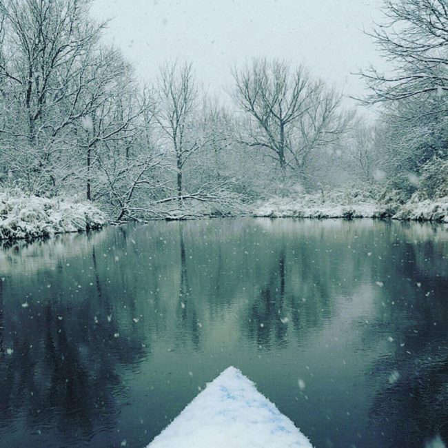 If you can stand the cold, kayaking during a snowfall is a beautiful sight