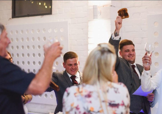 My little brother toasting at his friends wedding