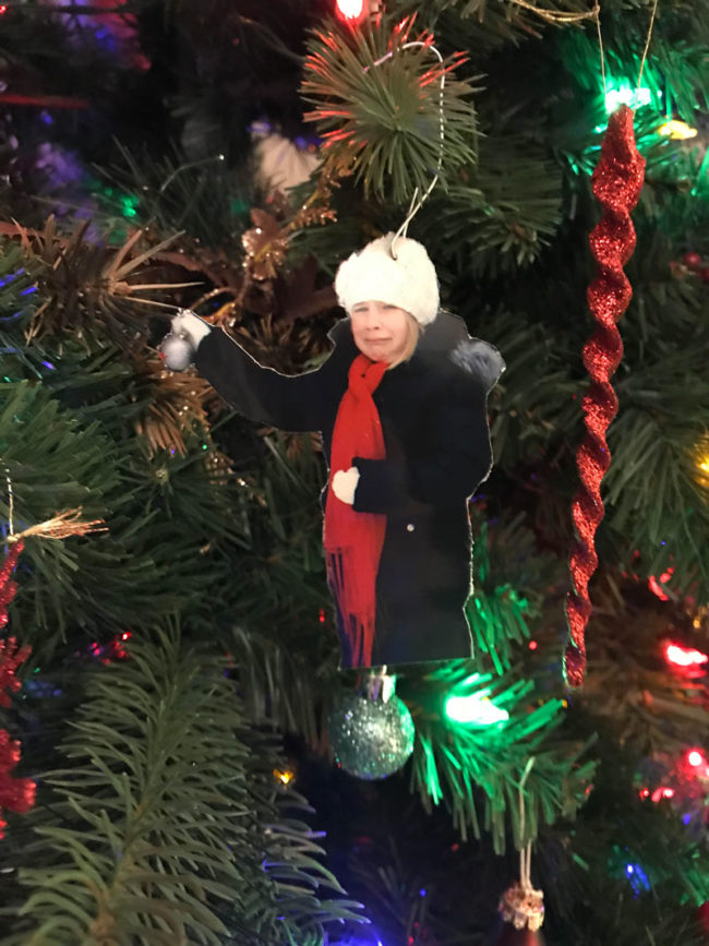 My step-daughter had a melt down while taking Christmas pictures a few years ago so I made this ornament that we now hang on the tree every year