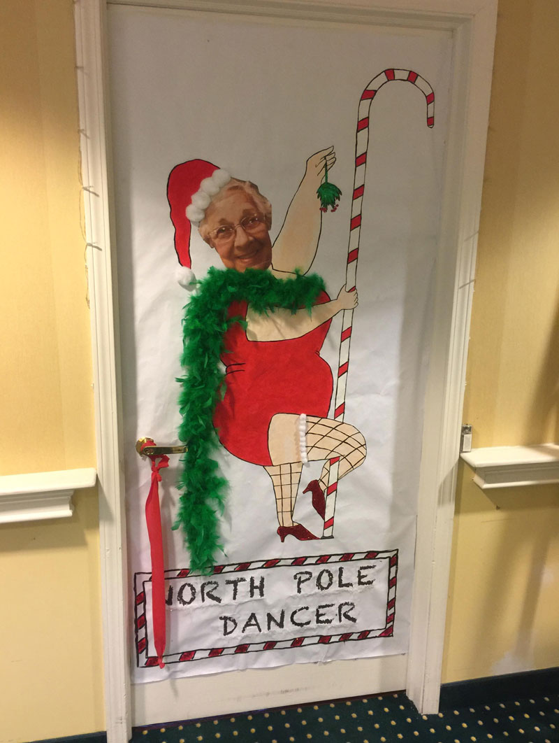 A lady decorated her door at a retirement home