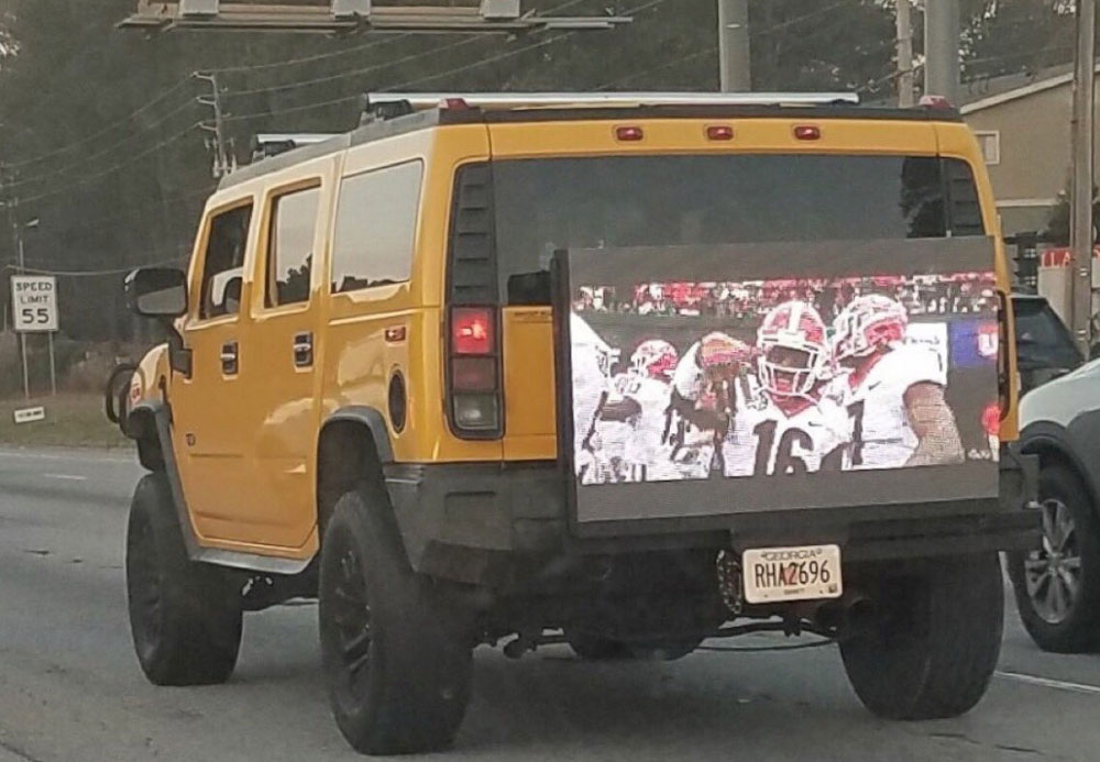 Someone hooked a TV to their hummer and drove around Atlanta playing the SEC championship over and over