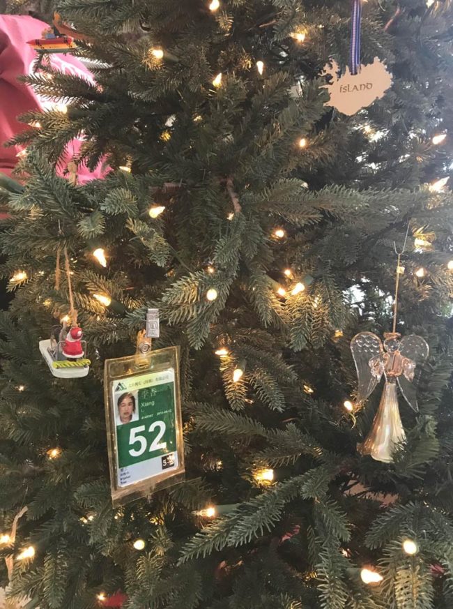 3 years ago this badge fell out of the upper section of our new tree. Now every Christmas, we celebrate the memory of worker #52