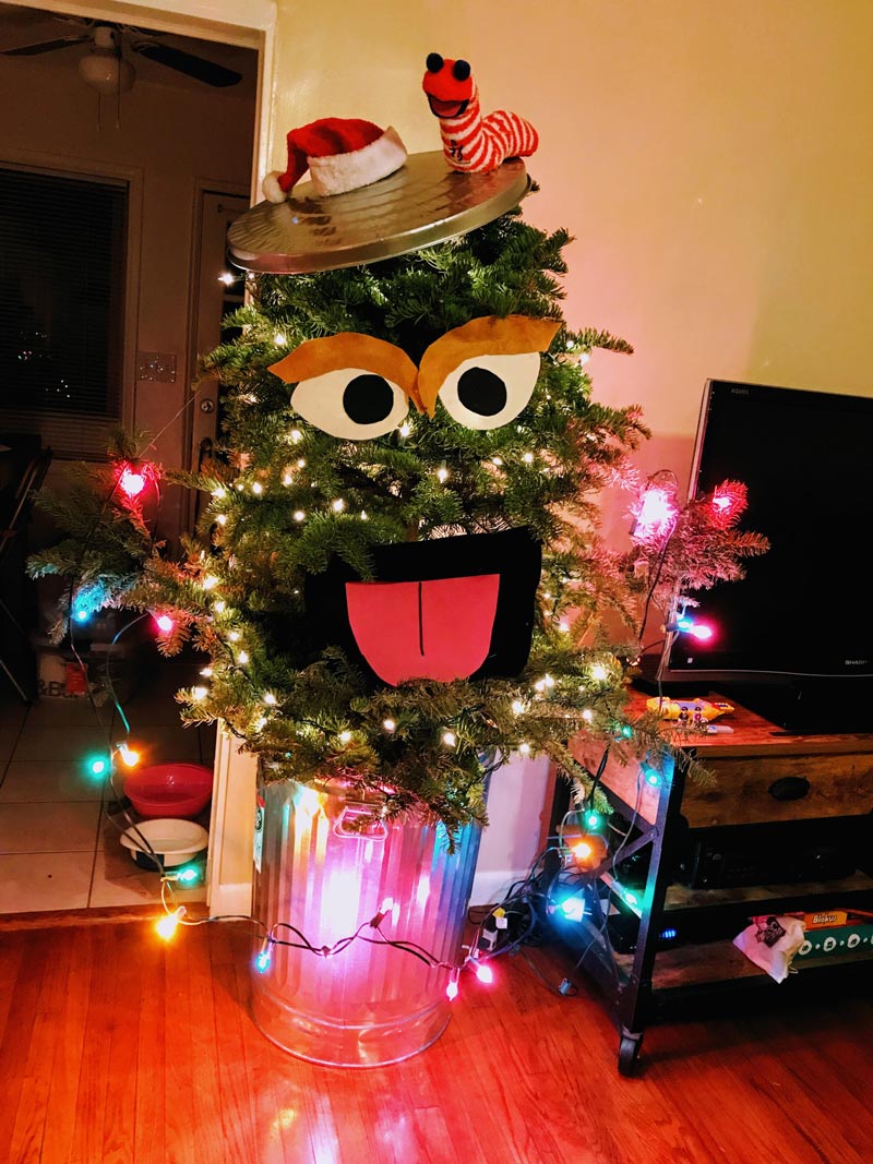 While shopping for a tree this year, my husband and I spotted an ugly misfit, oval shaped, flat top with a huge gap in the middle. Most were deterred, but we were instantly inspired! Meet Oscarmas (and Slimy)!