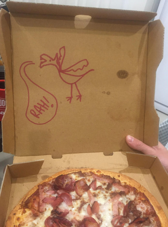 Asked Dominoes to "Draw your best Velociraptor on the box"