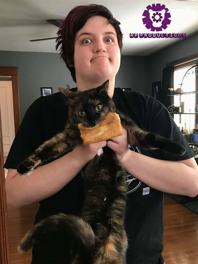 So my cat stole my toaster strudel out of the toaster today and my mom took a picture before prying it out of his mouth