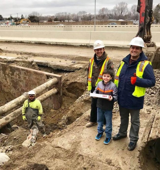 Johnny delivered donuts to a crew working on a chain of water main breaks in Livonia Michigan today. Little did they know he was hoping by them eating the donuts it would slow the process down and he would get another day off school. Well played Johnny, well played