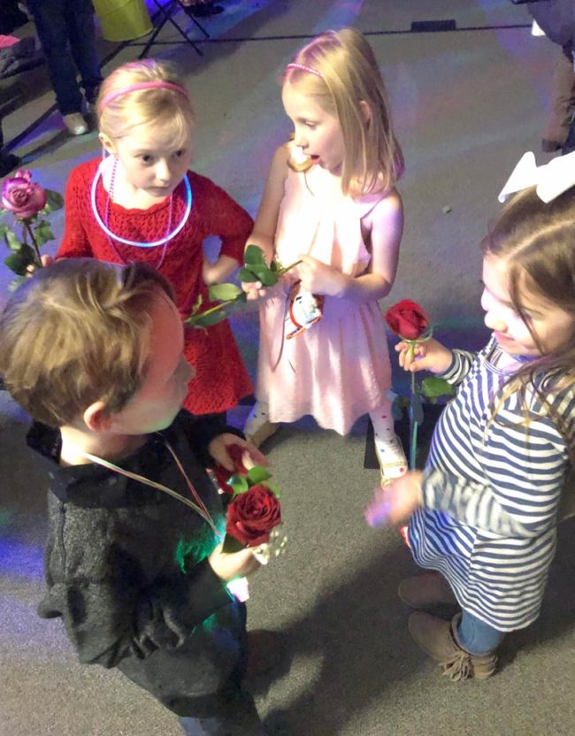 My 6 year old son had his first school dance tonight. Got caught giving roses to different girls