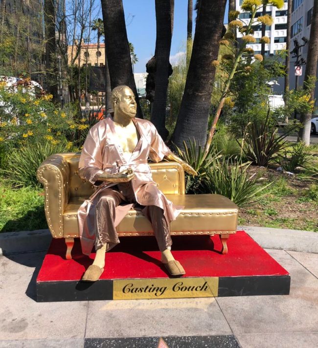 Pop-up statue of Harvey Weinstein moments before getting taken down