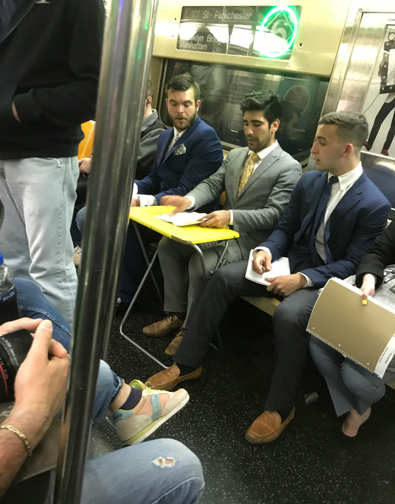 Dude just whipped out this desk on the subway and started his meeting
