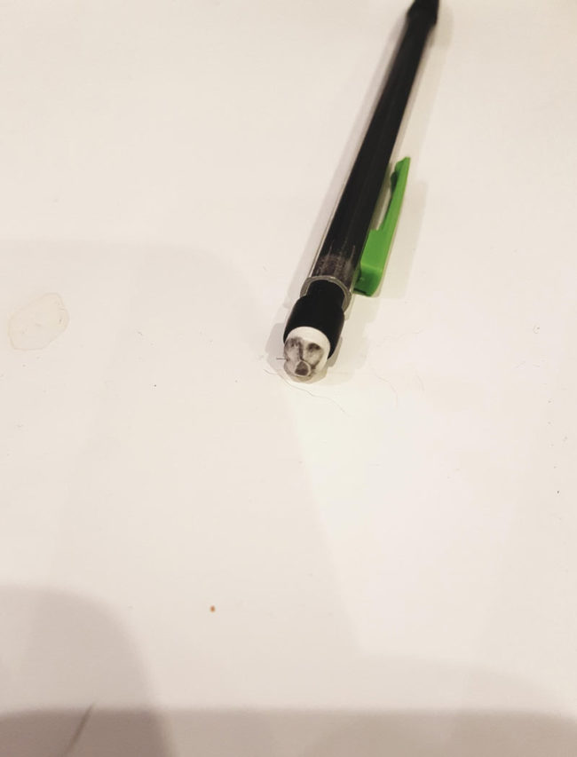 A face appeared on my pens eraser tip