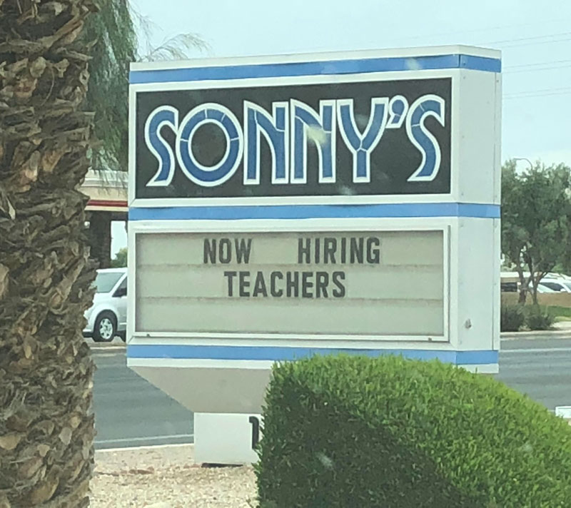 Sign at a Strip Club in Tucson, AZ during the current Teachers Strike for higher pay wages