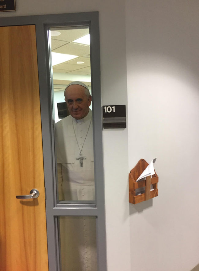 My local orchestra practices in the catholic center. Recently the room added a pope cardboard cutout. My stand mate moved the cutout to the window beside the cello’s entrance. I came around the corner and lost my sanity