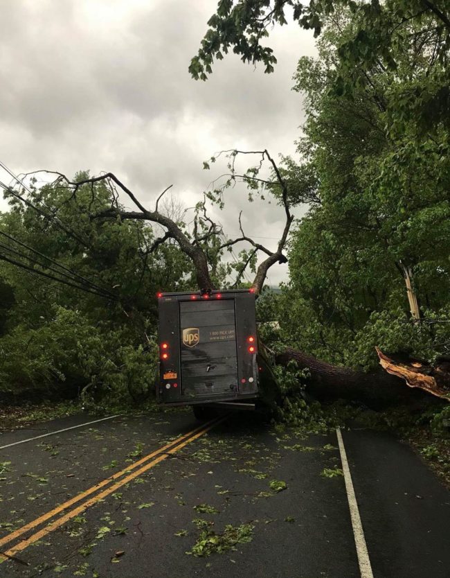 This happened during the storm in NY yesterday. Thankfully the driver is fine