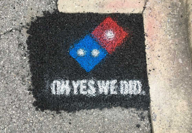 When Domino's fills the potholes because the city can't be bothered to do it