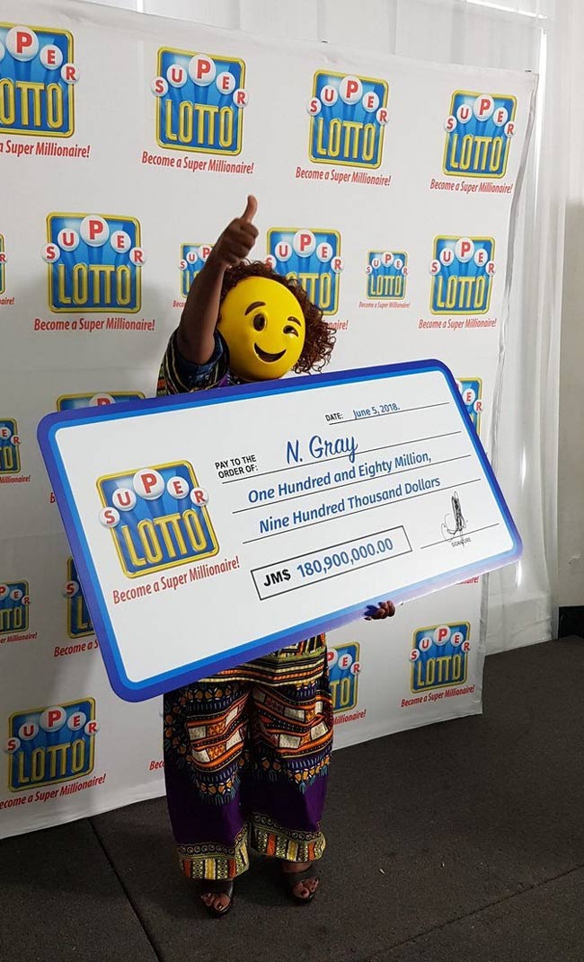 Lottery winner shows up in an emoji mask