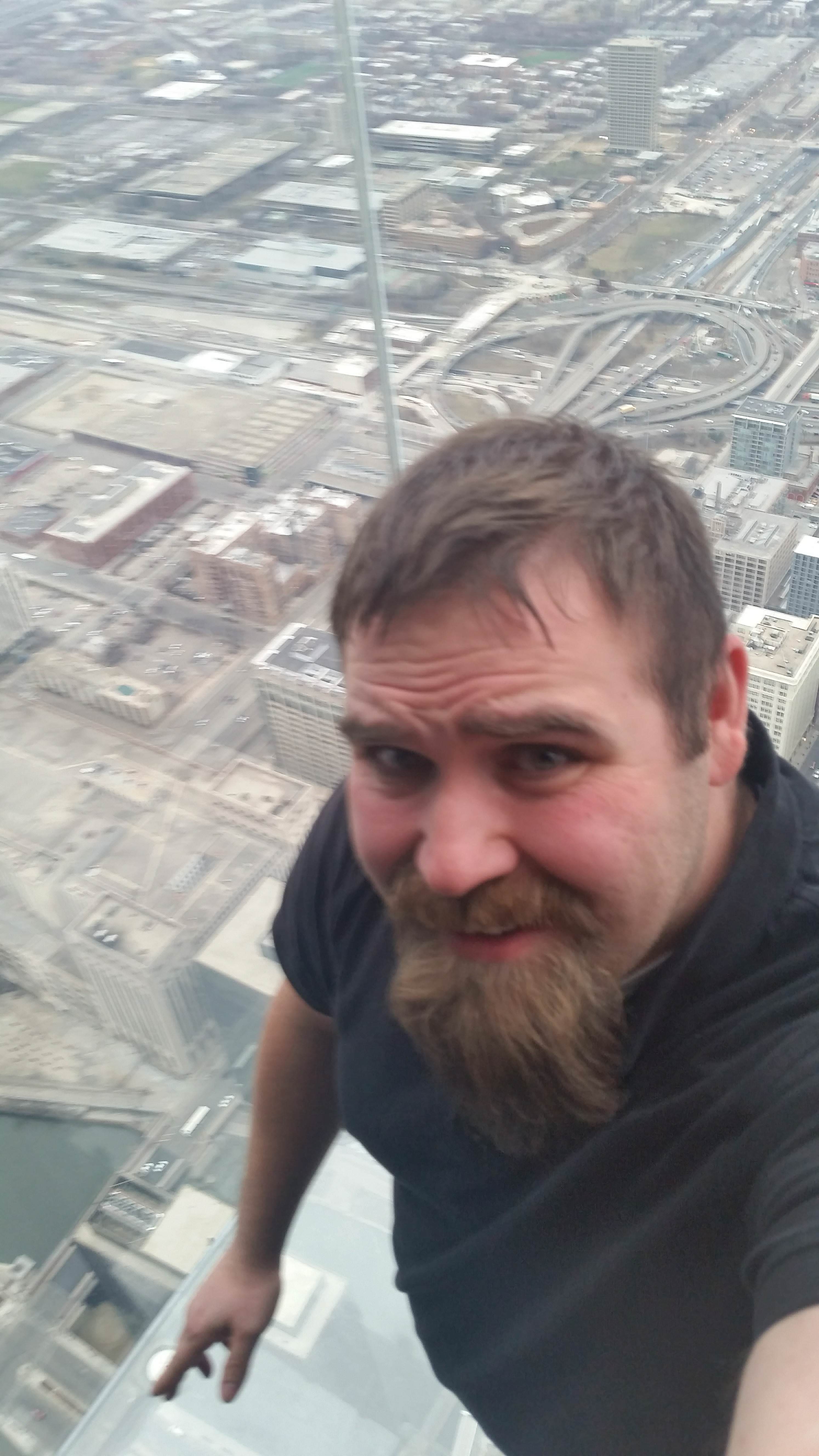 I'm deathly afraid of heights.. I went to the Skydeck at the Willis Tower (Sears Tower) and slowly inched my back to the edge, mustered up all composure I could and took a pic. I thought I nailed it until I saw the photo..