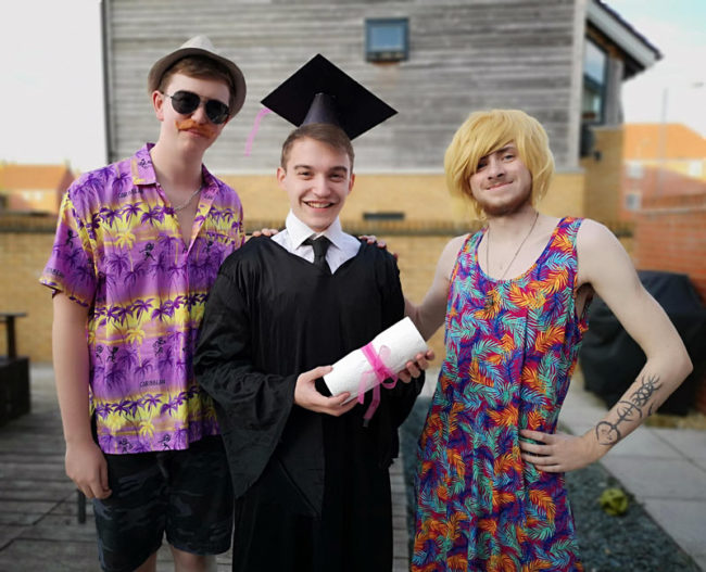 My mate wasn't going to his graduation due to his parent being away. So we took a budget graduation photo and stepped in as "Mom" and "Dad"