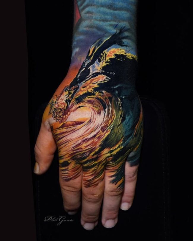 Wave hand tattoo
