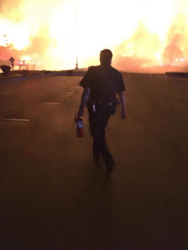 Our local law enforcement officer about to show this fire who's boss!