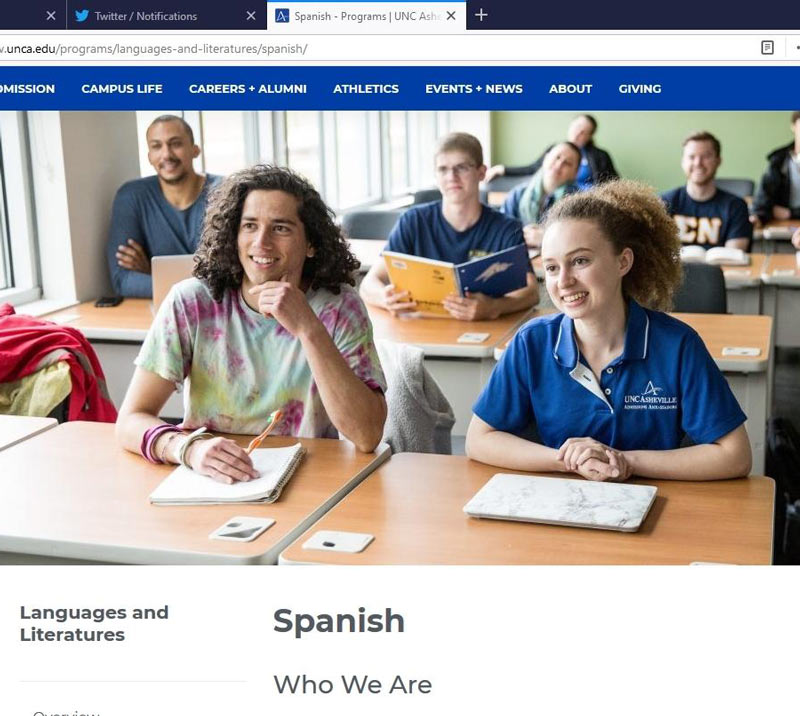 The dude on the North Carolina university Asheville website is holding a toothbrush instead of a pen