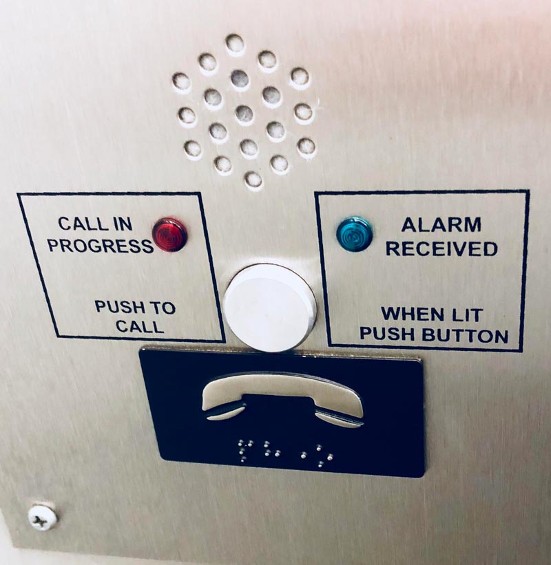 Sad clown elevator phone man