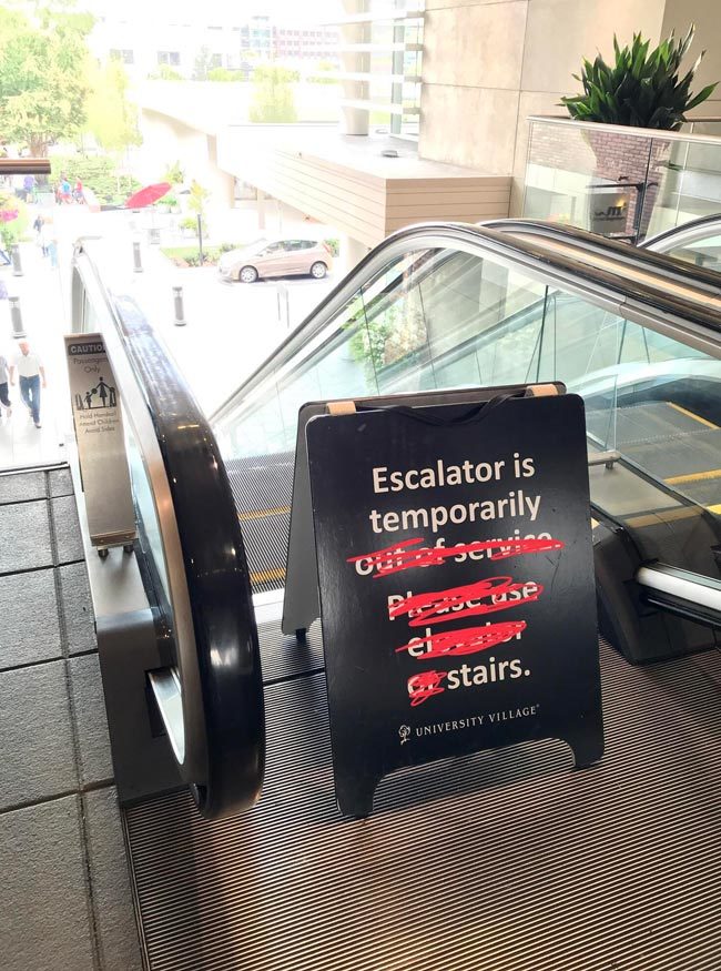 This escalator sign
