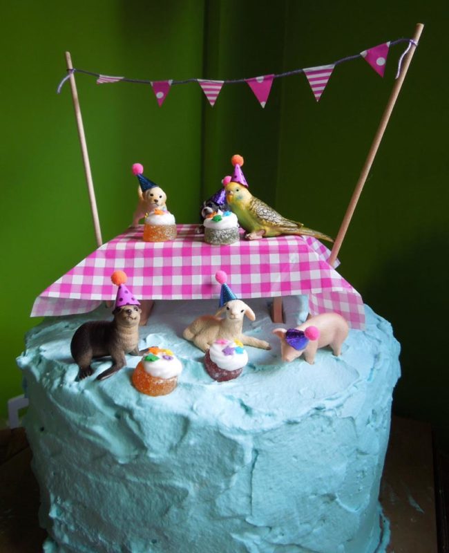 My daughter had a very specific birthday cake request, she asked for "Animals wearing birthday hats, having a party". I think I managed to pull it off