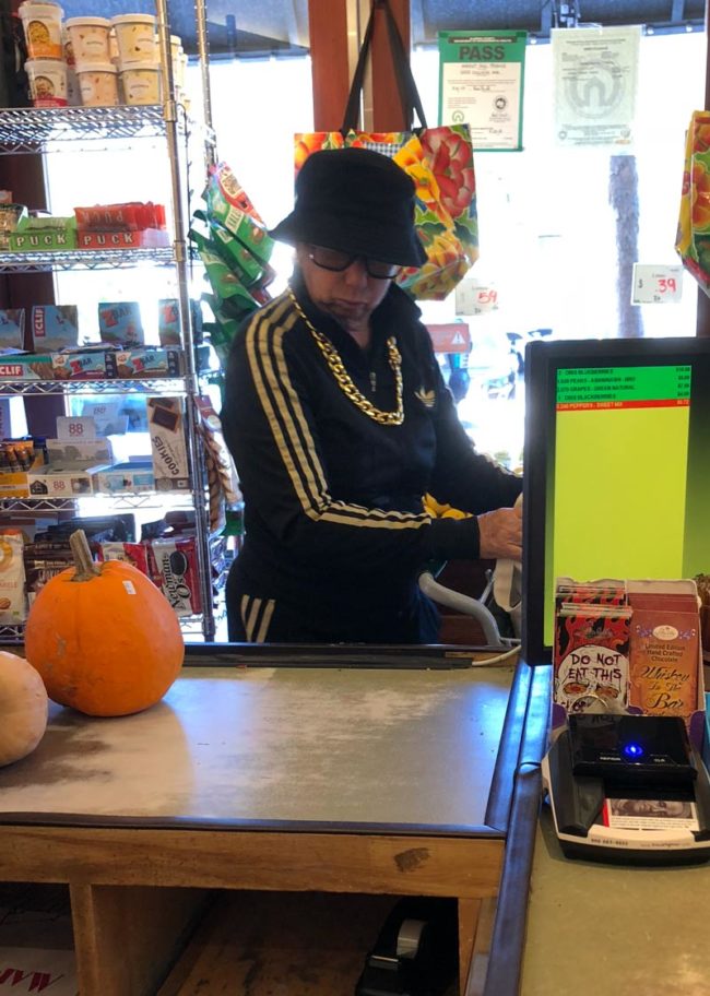 I can't tell if this old lady dressed up as Run DMC for Halloween or if that's her usual attire