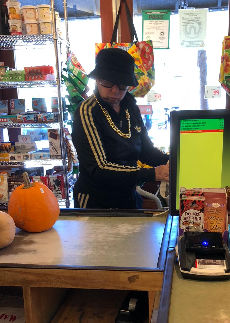 I can't tell if this old lady dressed up as Run DMC for Halloween or if that's her usual attire