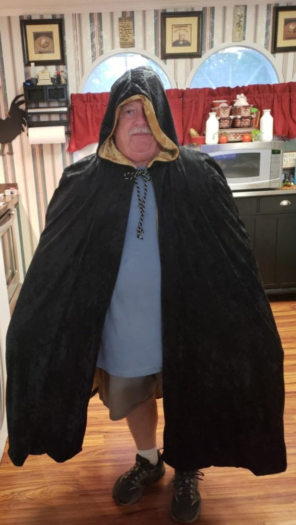 My mom made a warlock cloak for my son for Halloween. She made my dad wear it, so she could send me a picture of it