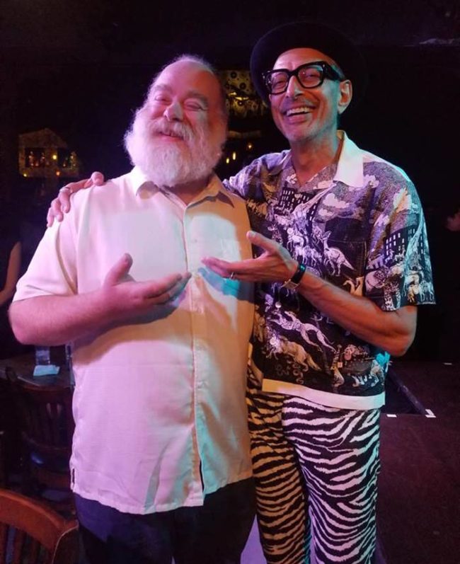 My buddy met this strange dude wearing a dinosaur shirt and zebra pants