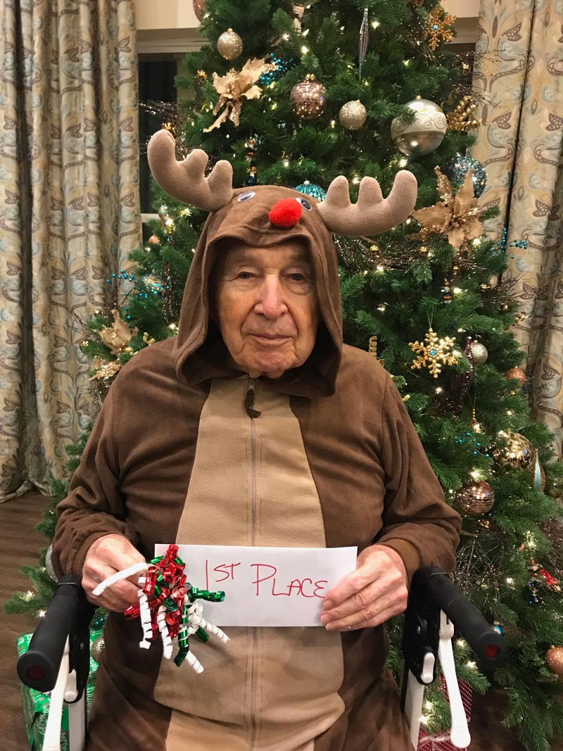My grandpa won 1st place in a Christmas costume party!