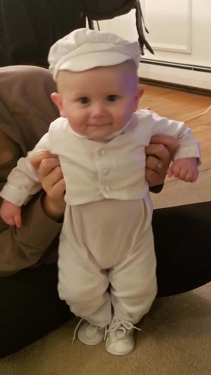 My sons christening tomorrow, the outfit my wife got him makes him look like a 1950's milk delivery man...