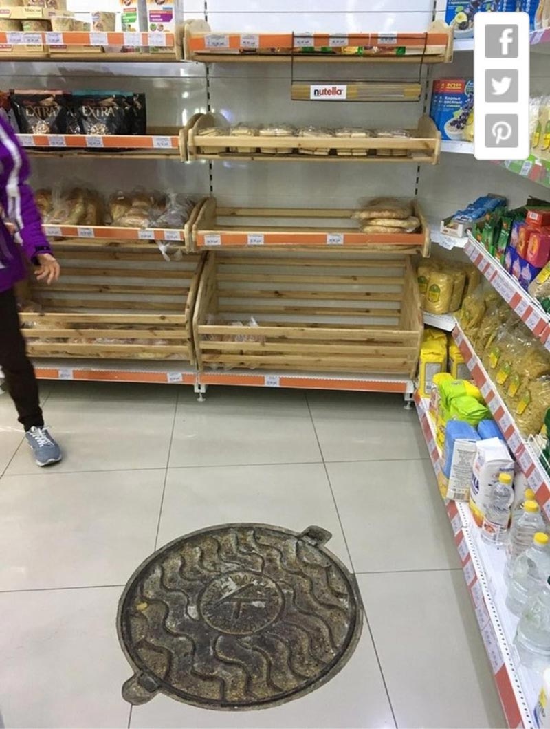 This store has a manhole, I presume it's so Ninja Turtles can conveniently grab pizza ingredients