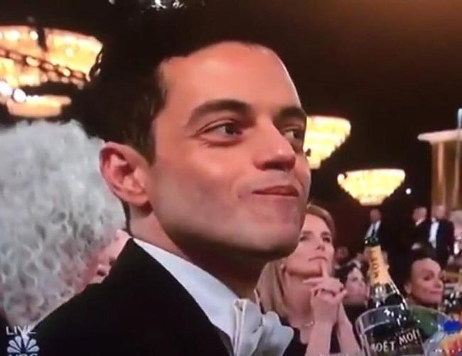 Rami Malek always looks like he's trying to eat chips as quietly as possible