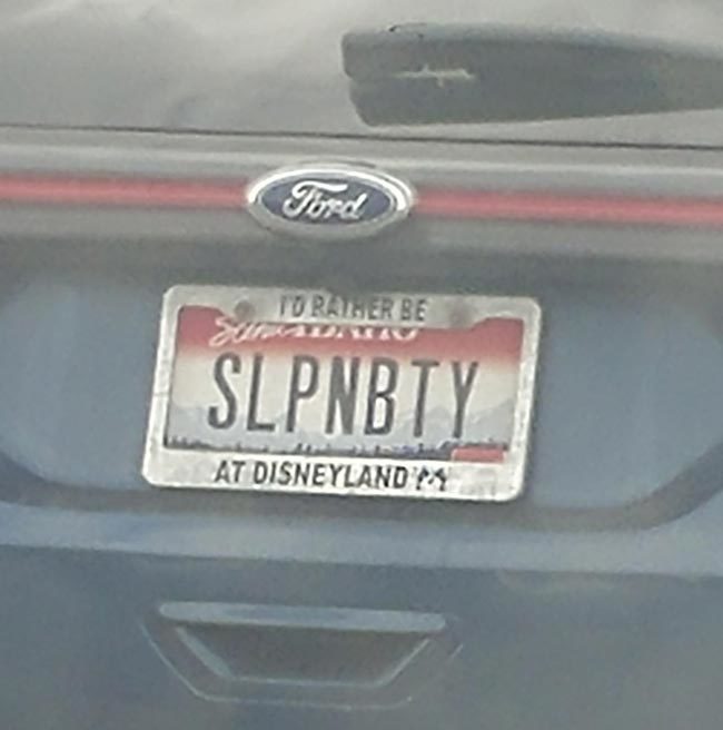 I first read this as "Slappin Booty" then I noticed the license plate frame