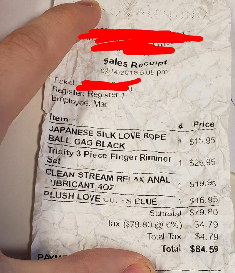 Co-worker threw a ball of paper at me. He didn't realize that it was his Valentine's Day receipt. Looks like he had a good time!