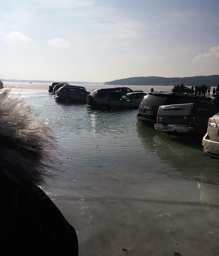 These people who parked on the ice before it melted, in Lake Geneva, Wisconsin